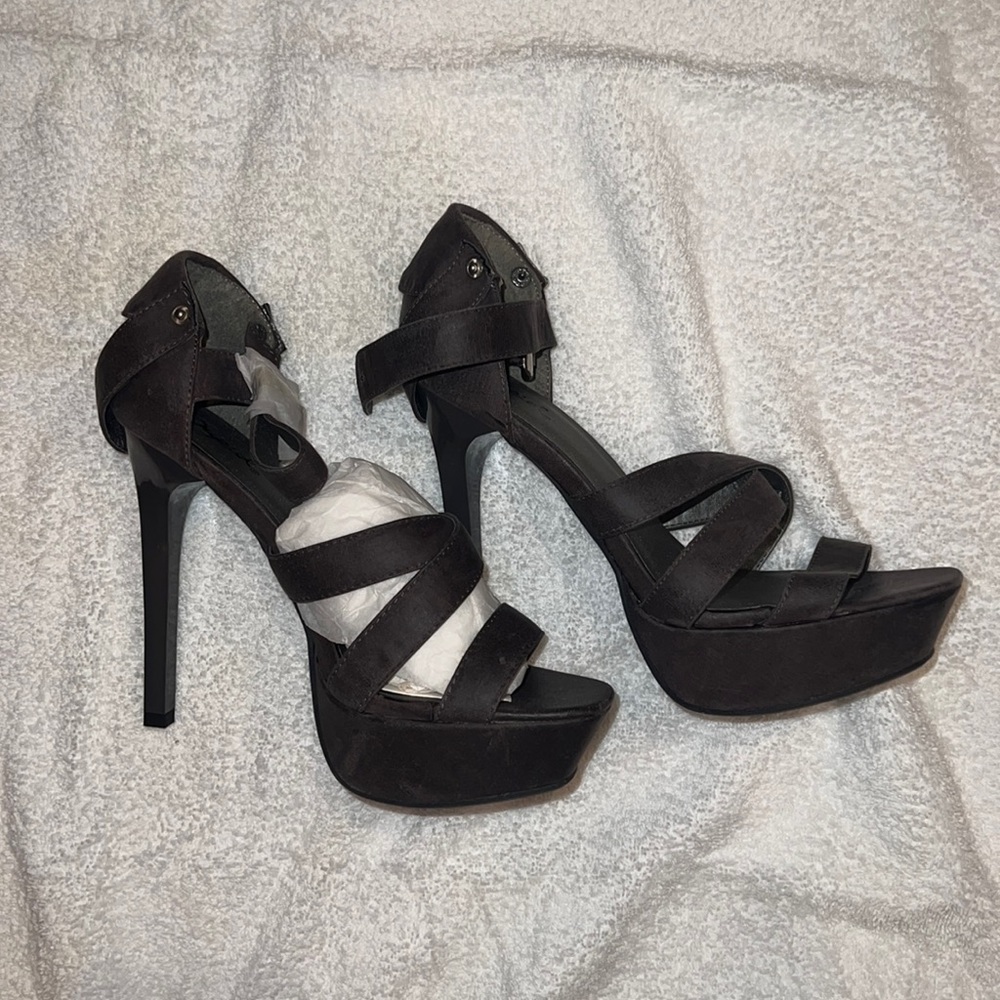 Never worn Quipid strap heel.